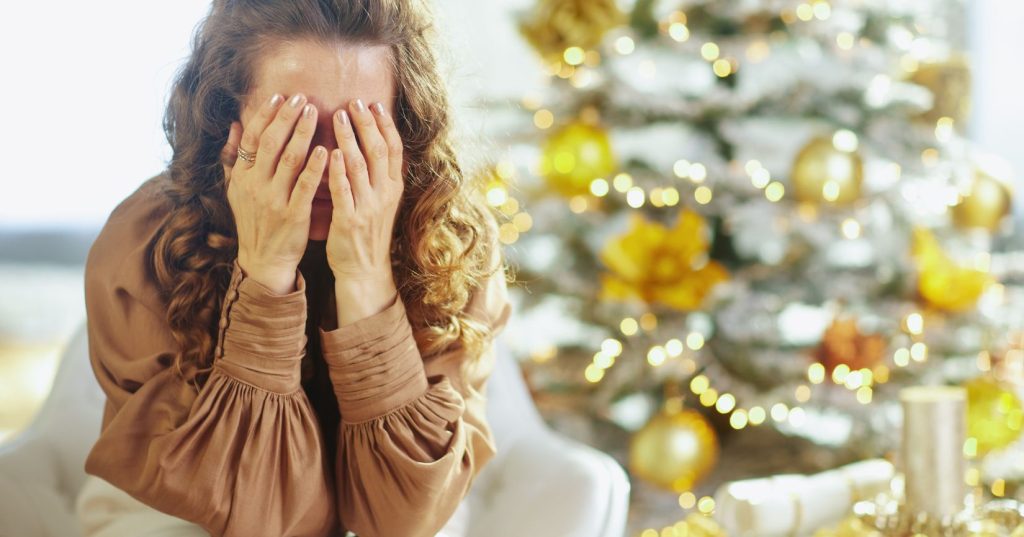 woman sitting and crying